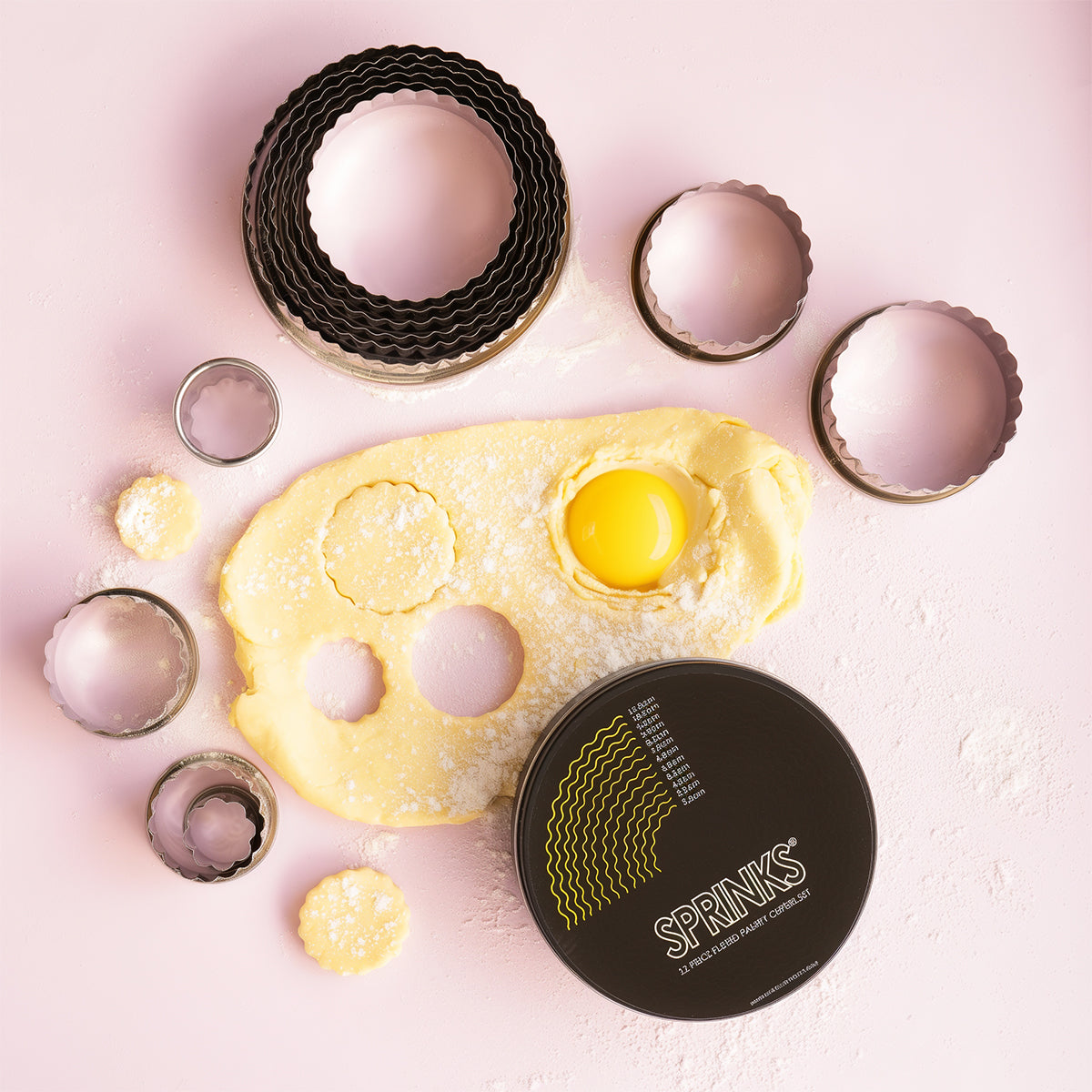 12-PIECE FLUTED STAINLESS PASTRY CUTTER SET - BY SPRINKS