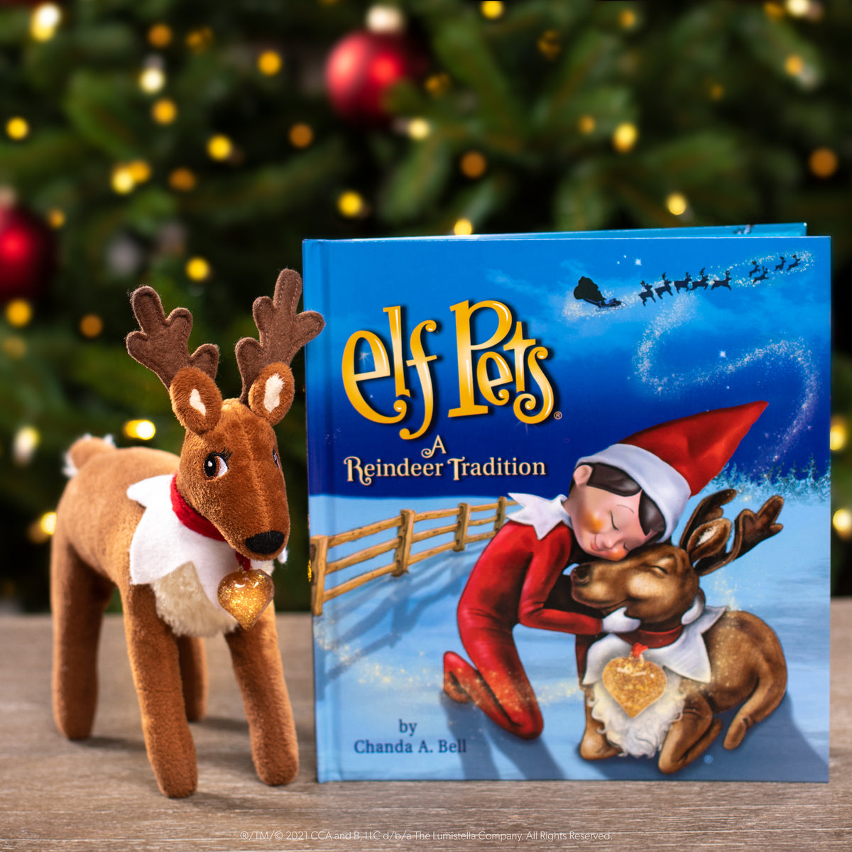 ELF PETS A REINDEER TRADITION